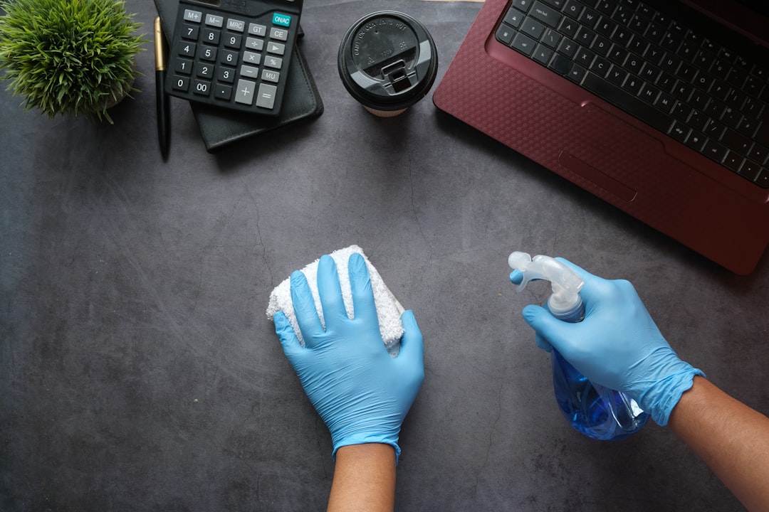 hands-cleaning-desk-with-spray-bottle-9gpkrsbgmc